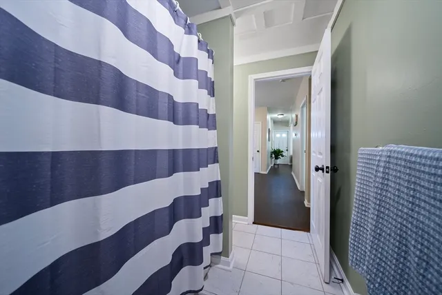 a bathroom with a sink a vanity and mirror