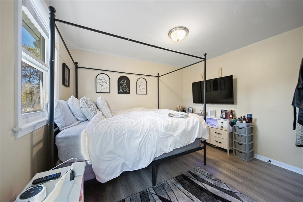 40 Bellevue Avenue Haverhill, MA 01832 - Photo 23 of 38 a bed room with a bed tv and a window