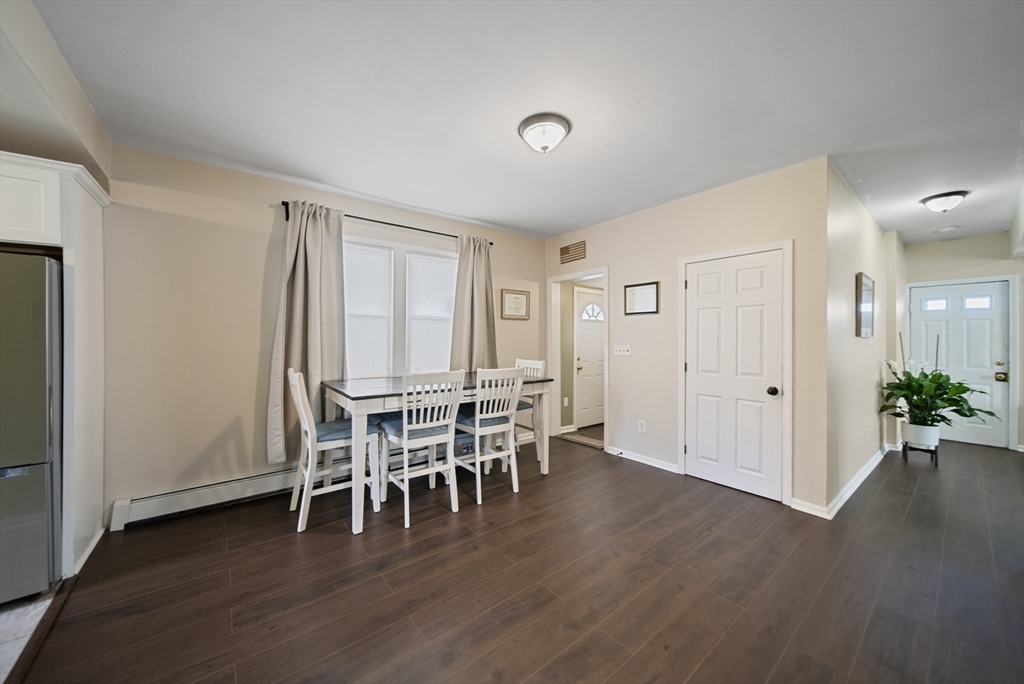 40 Bellevue Avenue Haverhill, MA 01832 - Photo 10 of 38 a view of a dining room with furniture and wooden floor