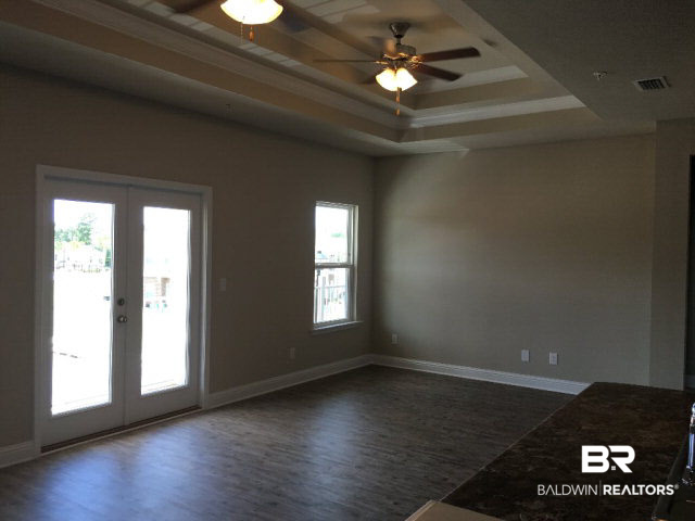 6867 Spaniel Drive, Unit 16 Daphne, AL 36527 - Photo 9 of 10 Livining Room/Dinind