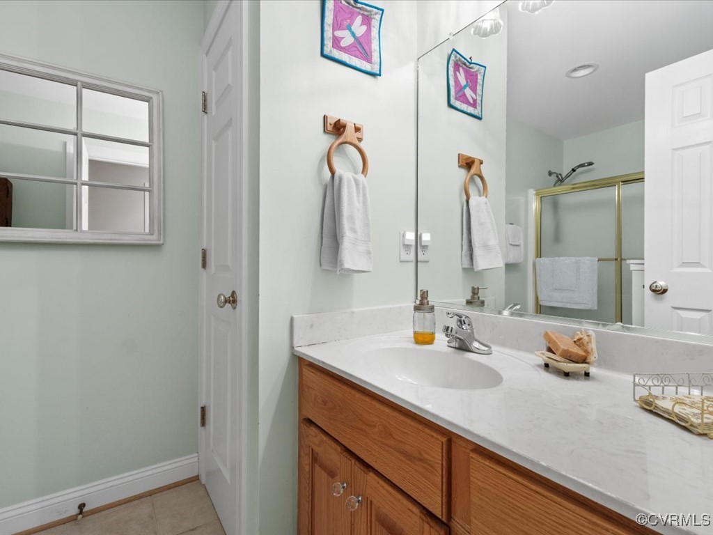 1875 Capeway Road Powhatan, VA 23139 - Photo 17 of 42 a bathroom with a sink and a mirror