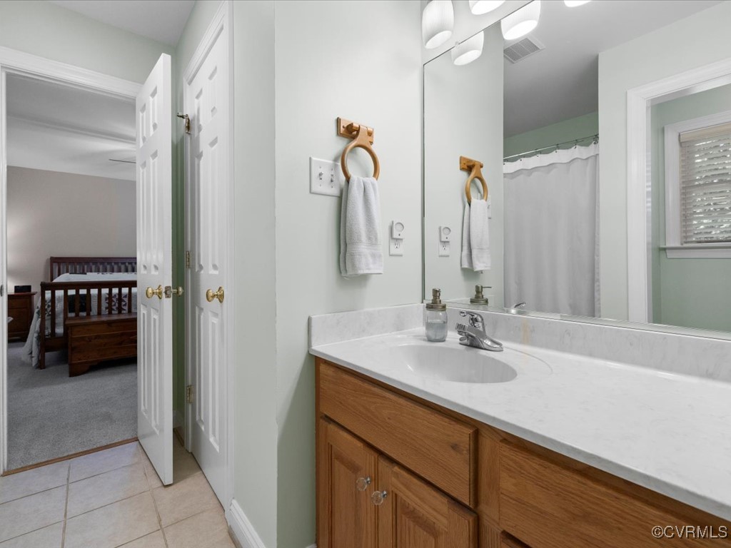1875 Capeway Road Powhatan, VA 23139 - Photo 18 of 42 a bathroom with a sink and a mirror