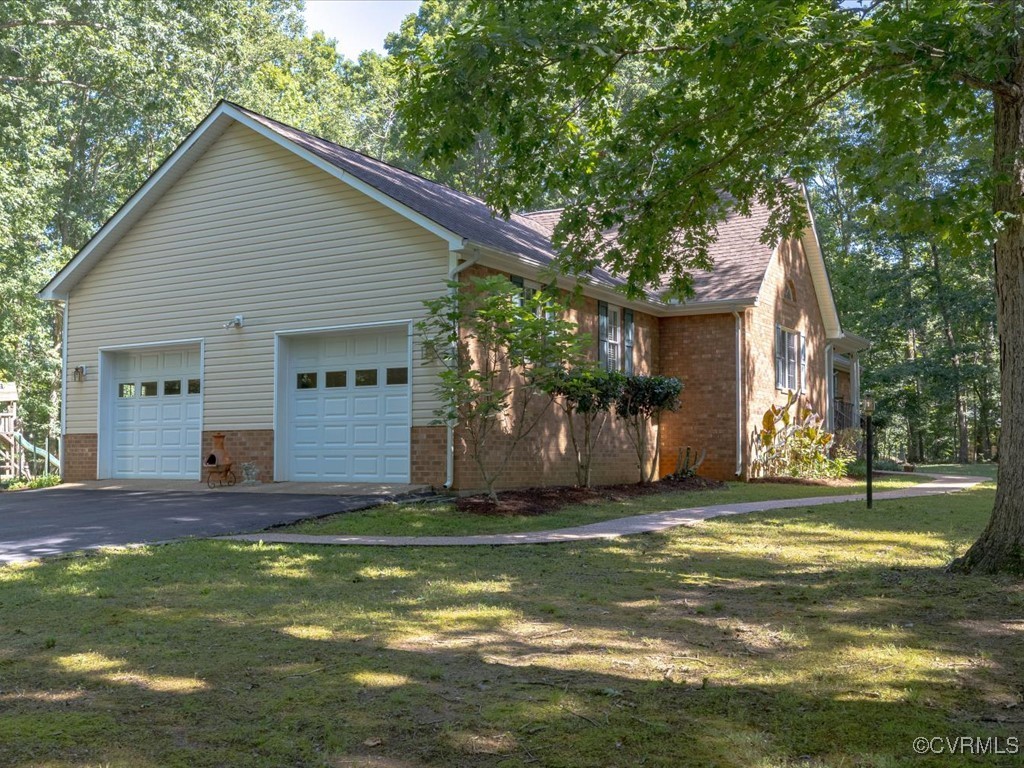1875 Capeway Road Powhatan, VA 23139 - Photo 25 of 42 a view of a house with a yard and sitting area