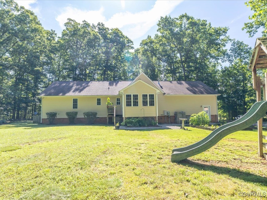 1875 Capeway Road Powhatan, VA 23139 - Photo 28 of 42 a view of a house with swimming pool and a yard
