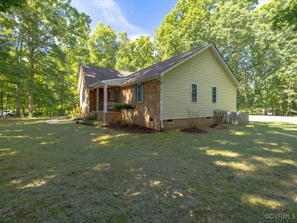1875 Capeway Road Powhatan, VA 23139 - Photo 30 of 42 a view of backyard of house with green space