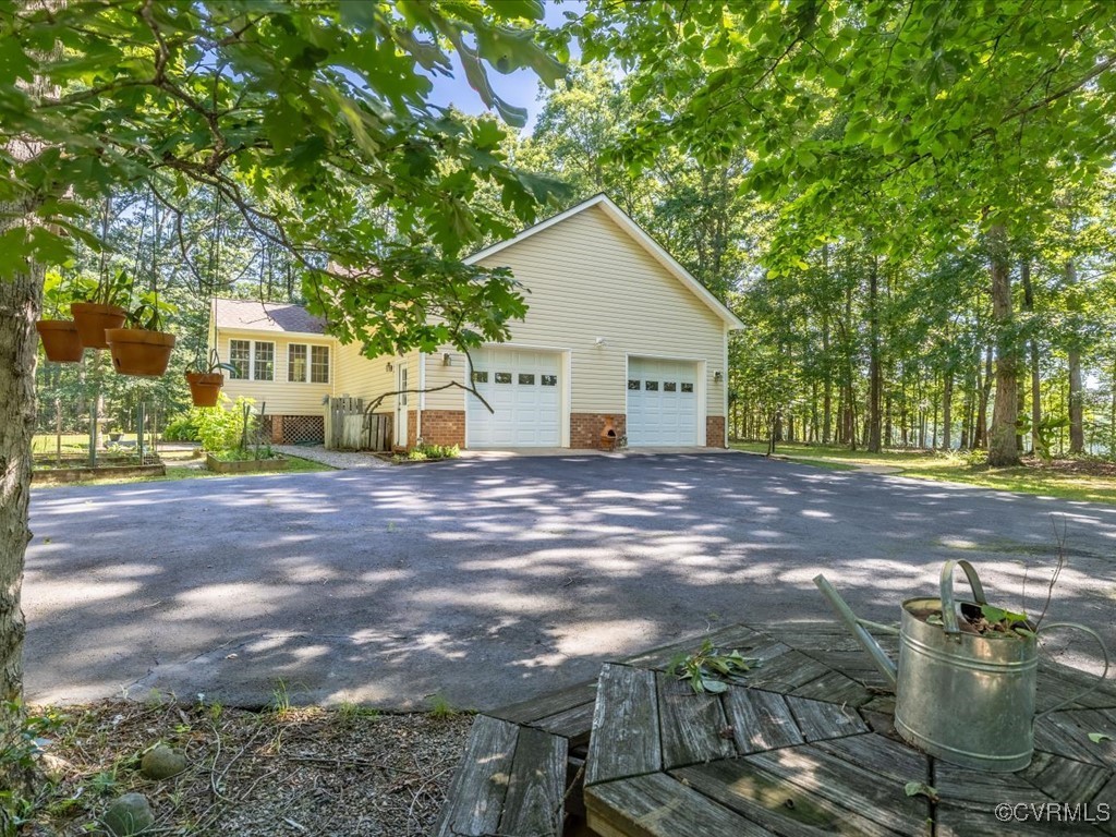1875 Capeway Road Powhatan, VA 23139 - Photo 31 of 42 a view of a house with a yard