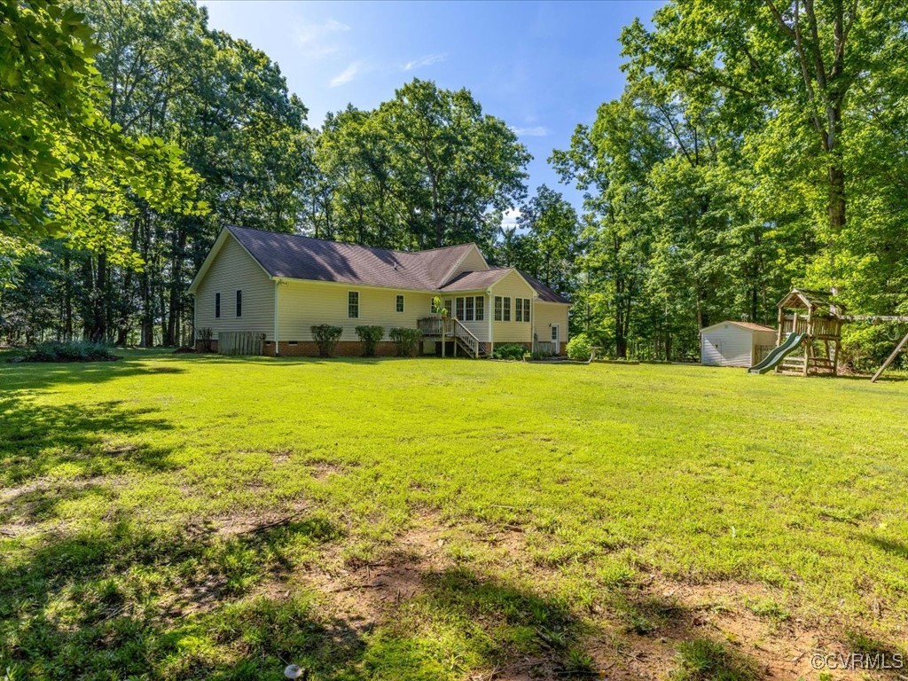 1875 Capeway Road Powhatan, VA 23139 - Photo 35 of 42 a view of house with swimming pool