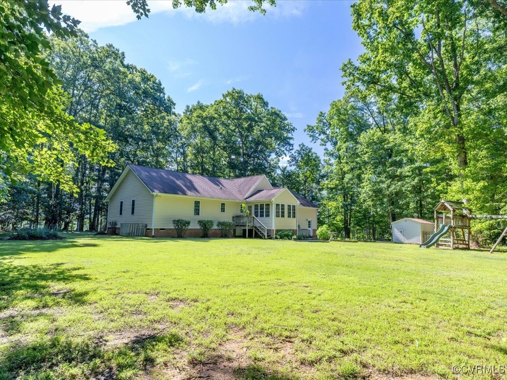 1875 Capeway Road Powhatan, VA 23139 - Photo 36 of 42 a view of a house with a yard