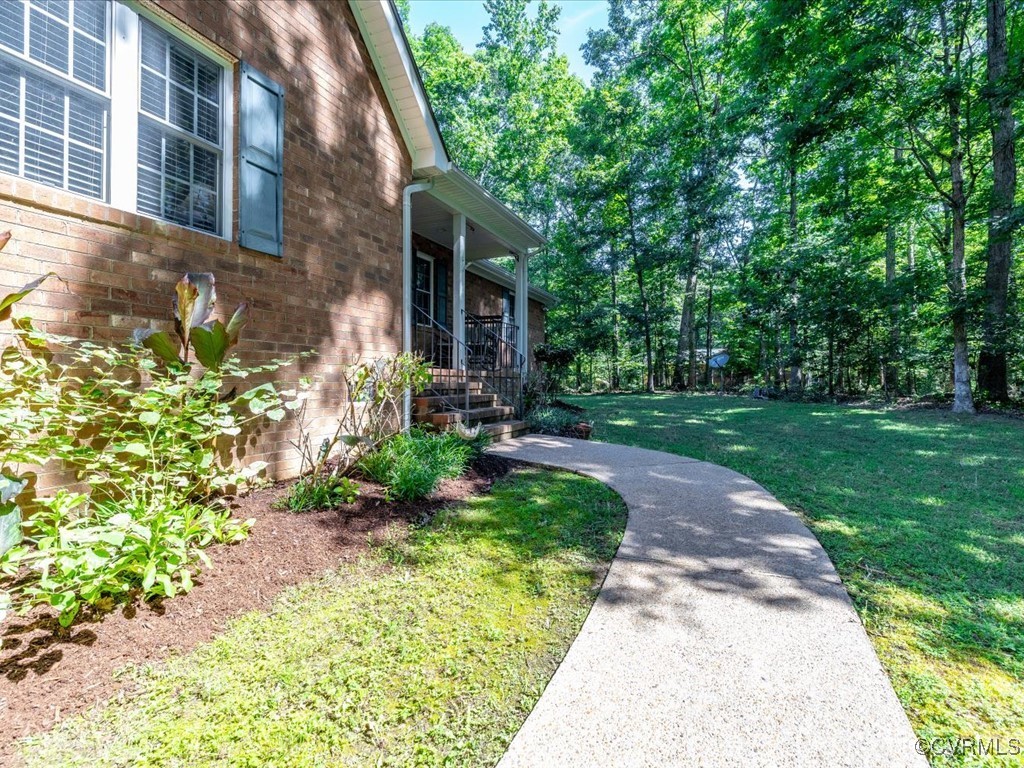 1875 Capeway Road Powhatan, VA 23139 - Photo 37 of 42 a front view of a house with a yard