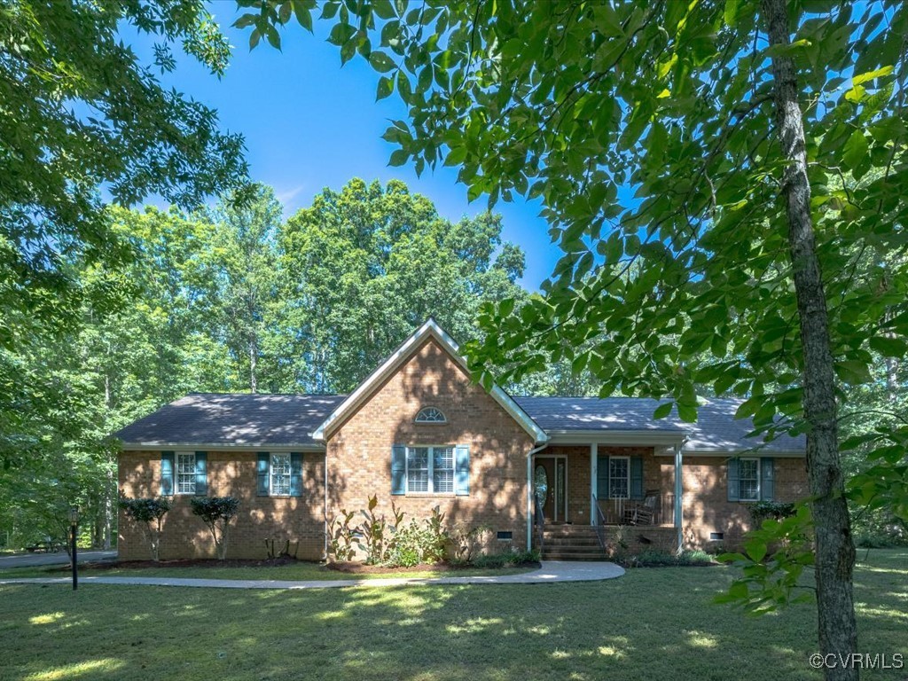 1875 Capeway Road Powhatan, VA 23139 - Photo 41 of 42 a front view of a house with garden
