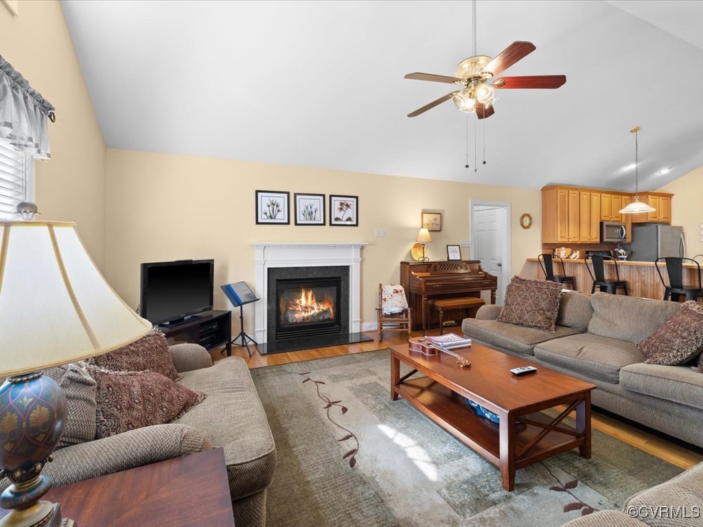 1875 Capeway Road Powhatan, VA 23139 - Photo 5 of 42 a living room with furniture and a fireplace
