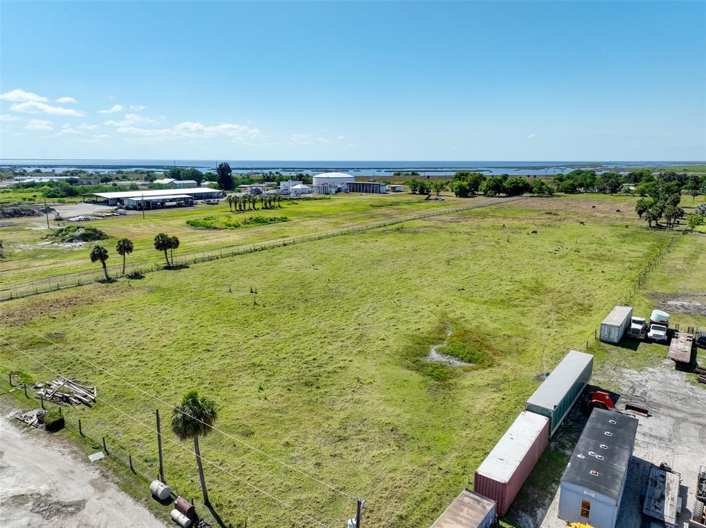 651 Highway 78 Okeechobee, FL 34974 - Photo 15 of 20 a view of a lake with a yard