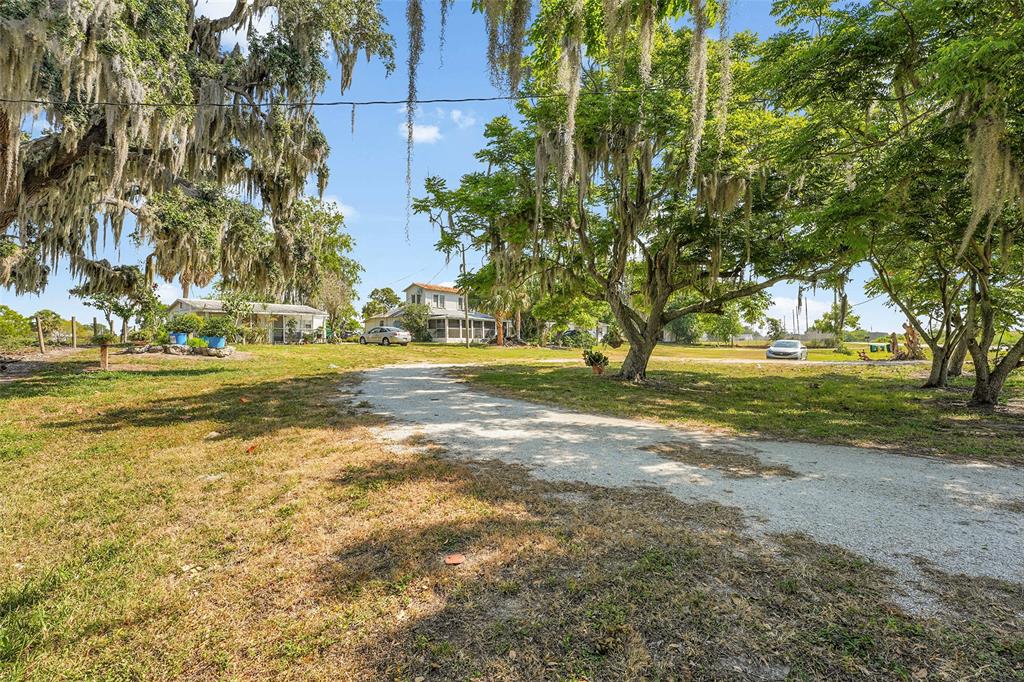 651 Highway 78 Okeechobee, FL 34974 - Photo 3 of 20 a view of a trees in a yard