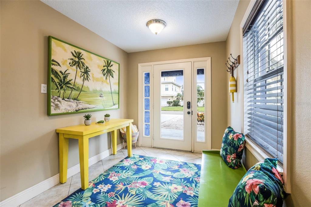 318 64th Street Holmes Beach, FL 34217 - Photo 7 of 33 a very nice looking room with a large window