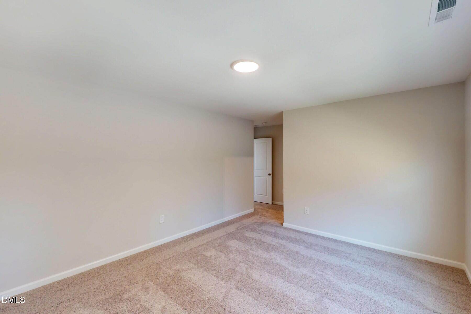 109 Tawny Slope Court, Unit 13 Raleigh, NC 27603 - Photo 27 of 48 a view of an empty room