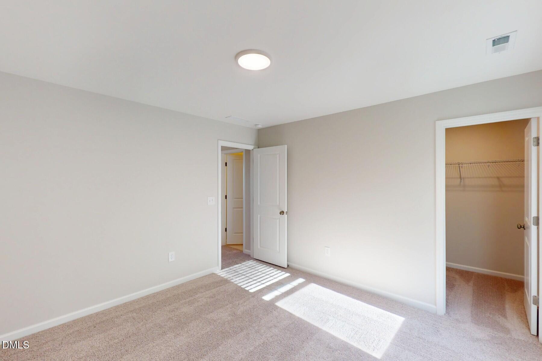 109 Tawny Slope Court, Unit 13 Raleigh, NC 27603 - Photo 30 of 48 a view of an empty room