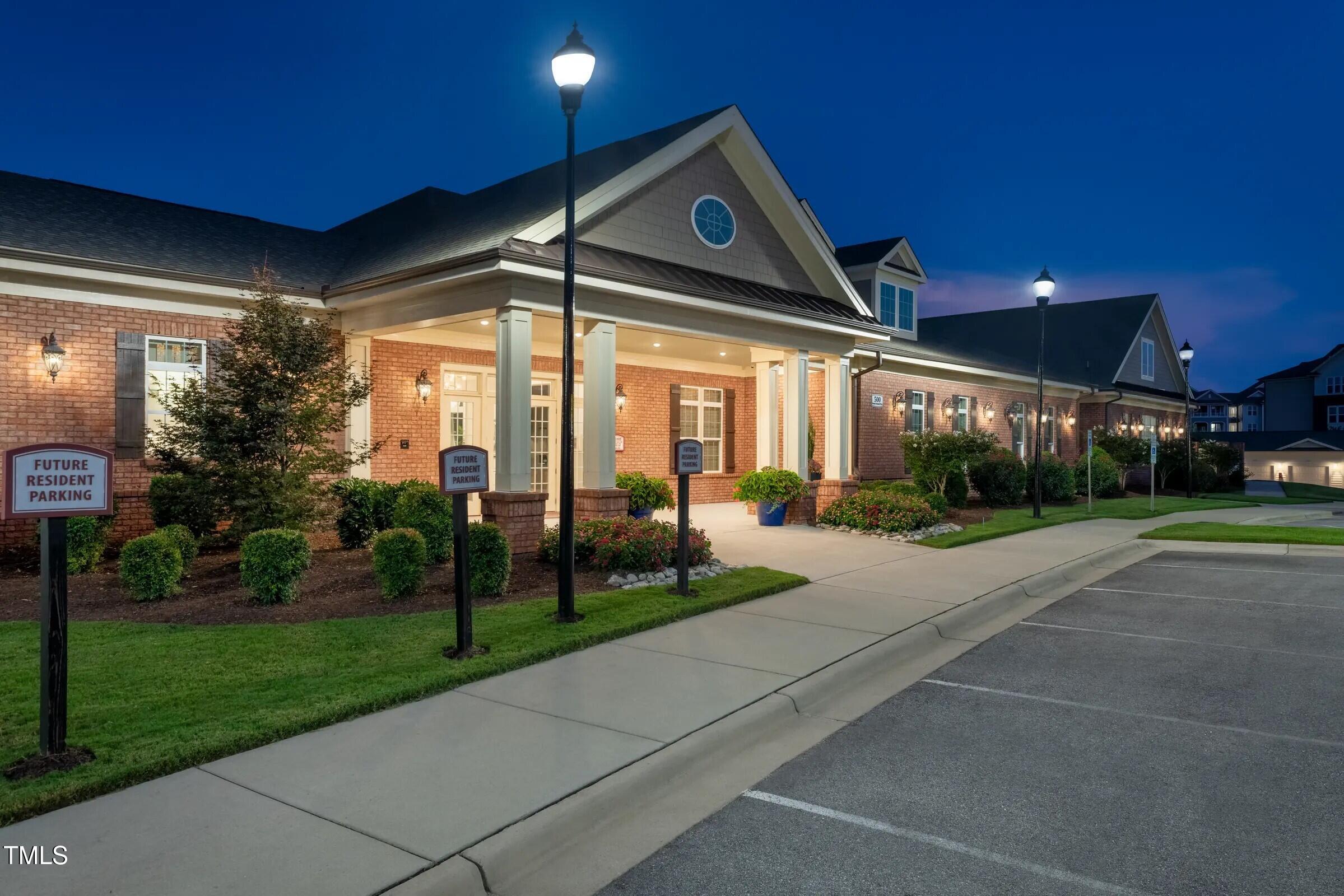 109 Tawny Slope Court, Unit 13 Raleigh, NC 27603 - Photo 34 of 48 a front view of a house with a yard