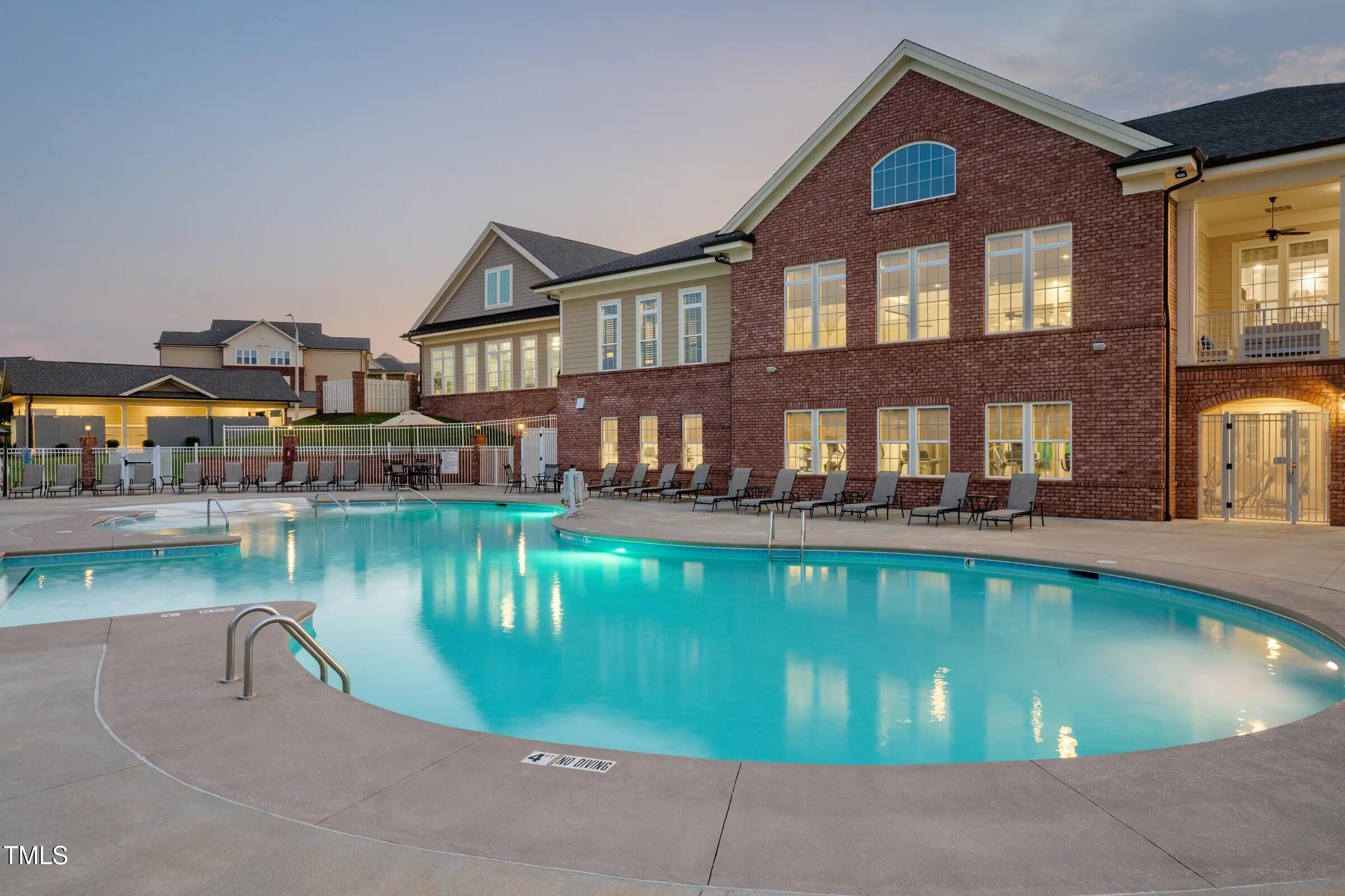 109 Tawny Slope Court, Unit 13 Raleigh, NC 27603 - Photo 35 of 48 a swimming pool view with a outdoor seating space