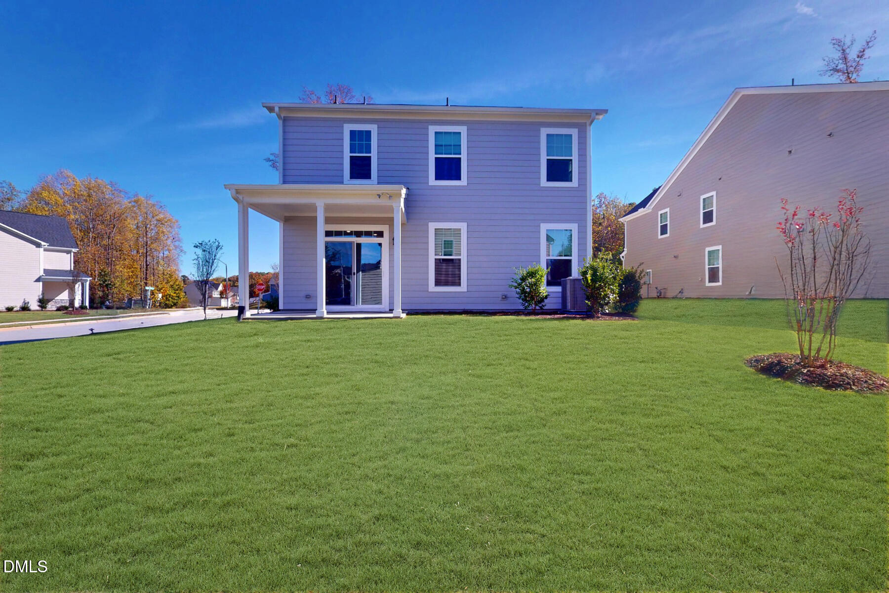 109 Tawny Slope Court, Unit 13 Raleigh, NC 27603 - Photo 6 of 48 a front view of a house with a yard