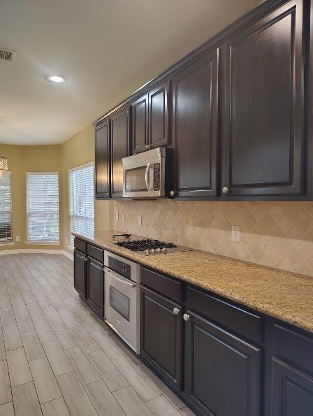 25211 Pineglen Terrace Drive Spring, TX 77389 - Photo 14 of 40 Spacious kitchen Open to family room