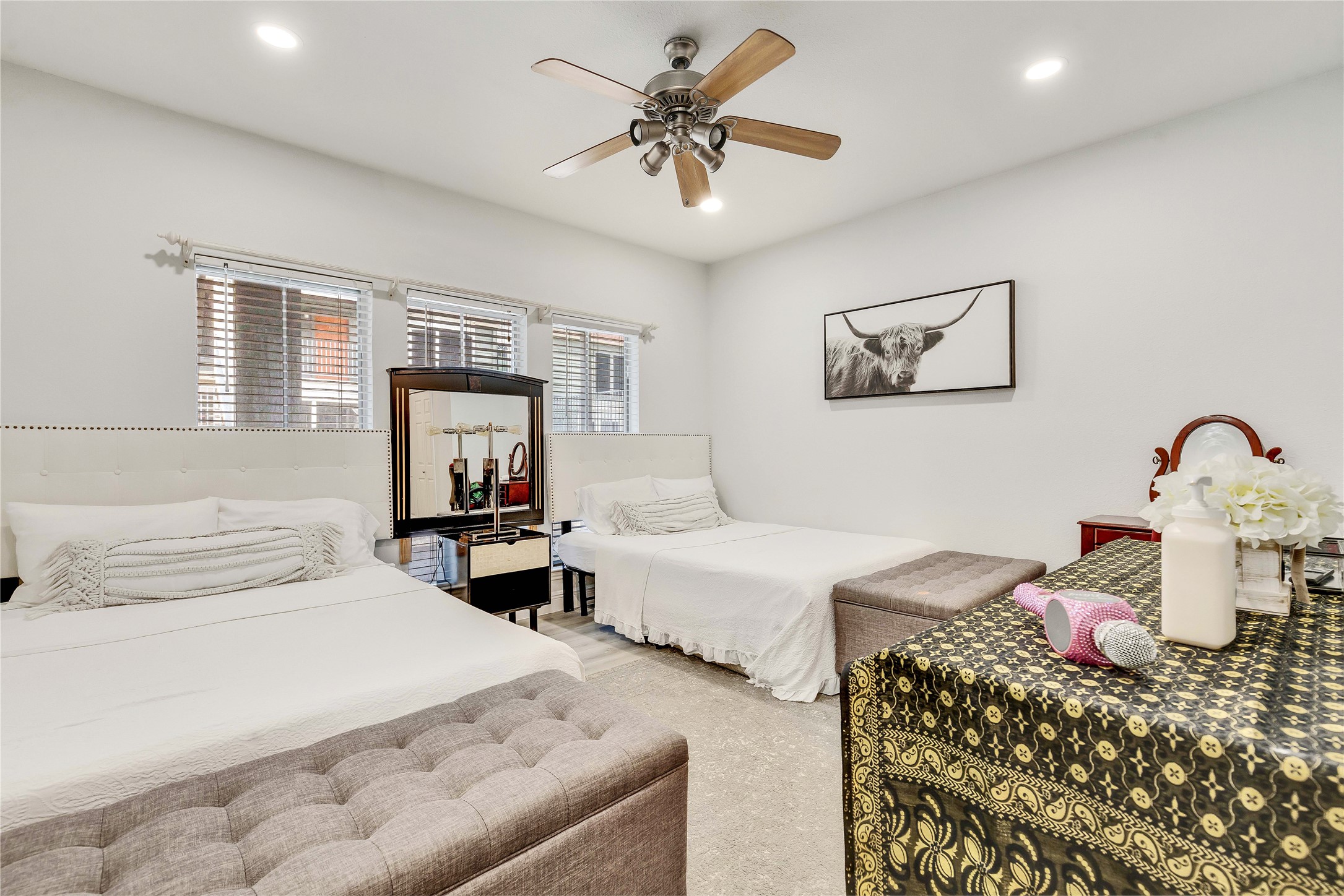 2529 Rio Grande Street, Unit 56 Austin, TX 78705 - Photo 11 of 16 Bedroom featuring ceiling fan and recessed lighting