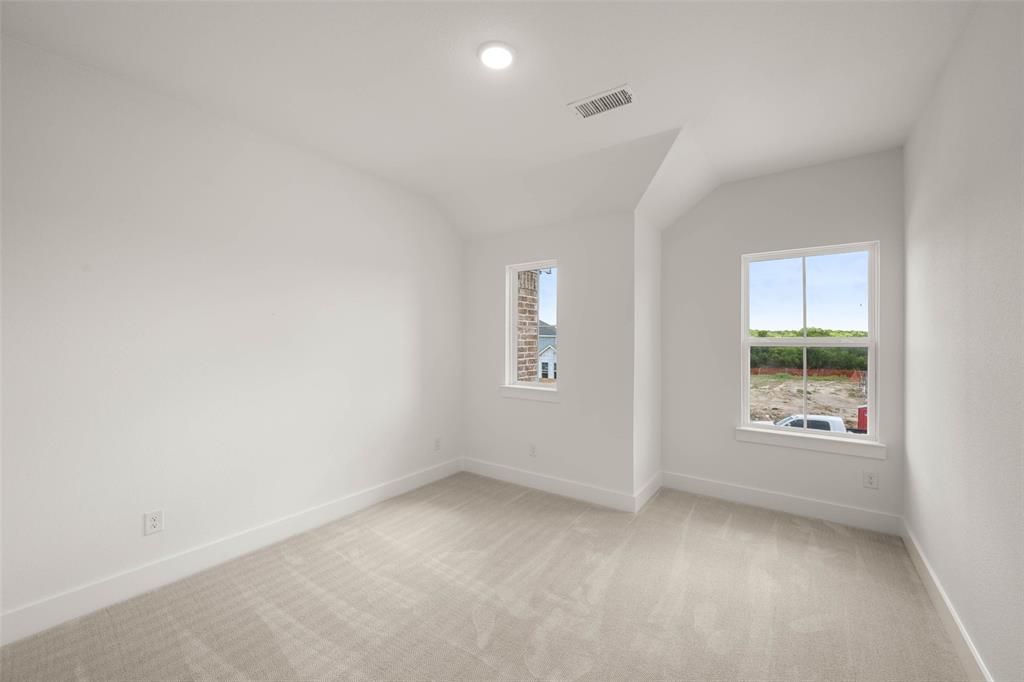 2223 Shady Elm Road Midlothian, TX 76065 - Photo 21 of 27 an empty room with a window