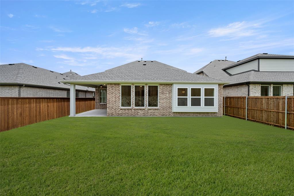 2223 Shady Elm Road Midlothian, TX 76065 - Photo 26 of 27 a house view with a garden space