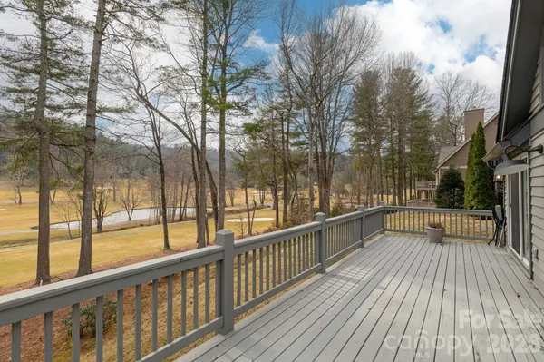 a view of balcony with furniture