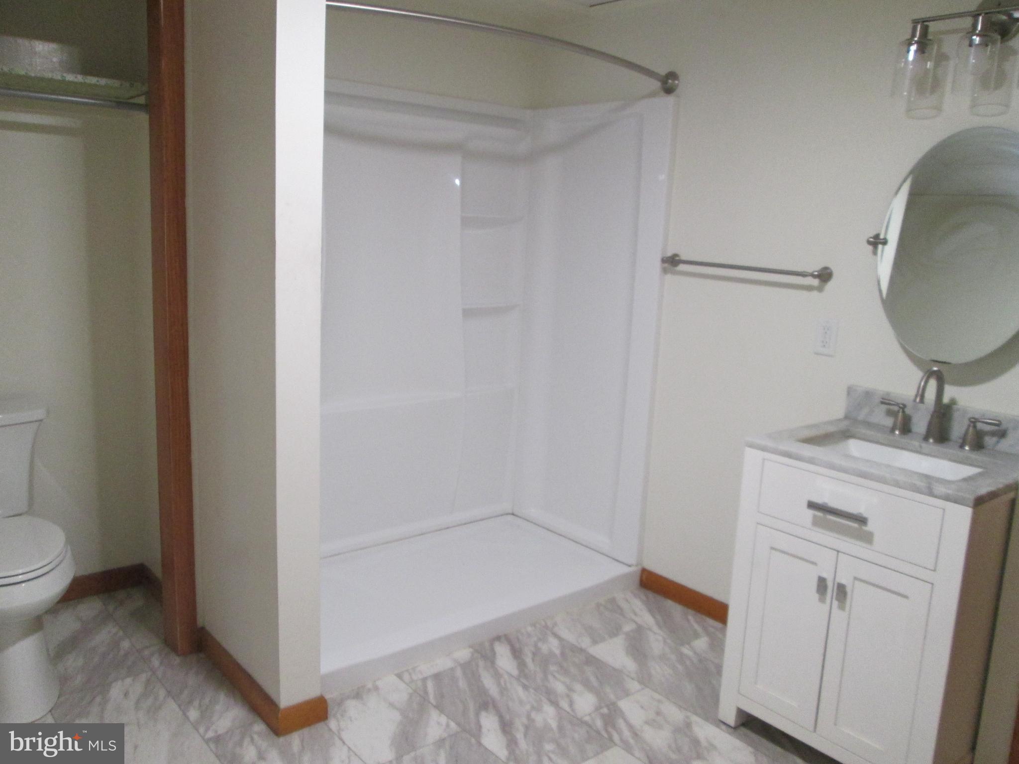 315 York Road Carlisle, PA 17013 - Photo 13 of 14 a bathroom with a sink and a mirror