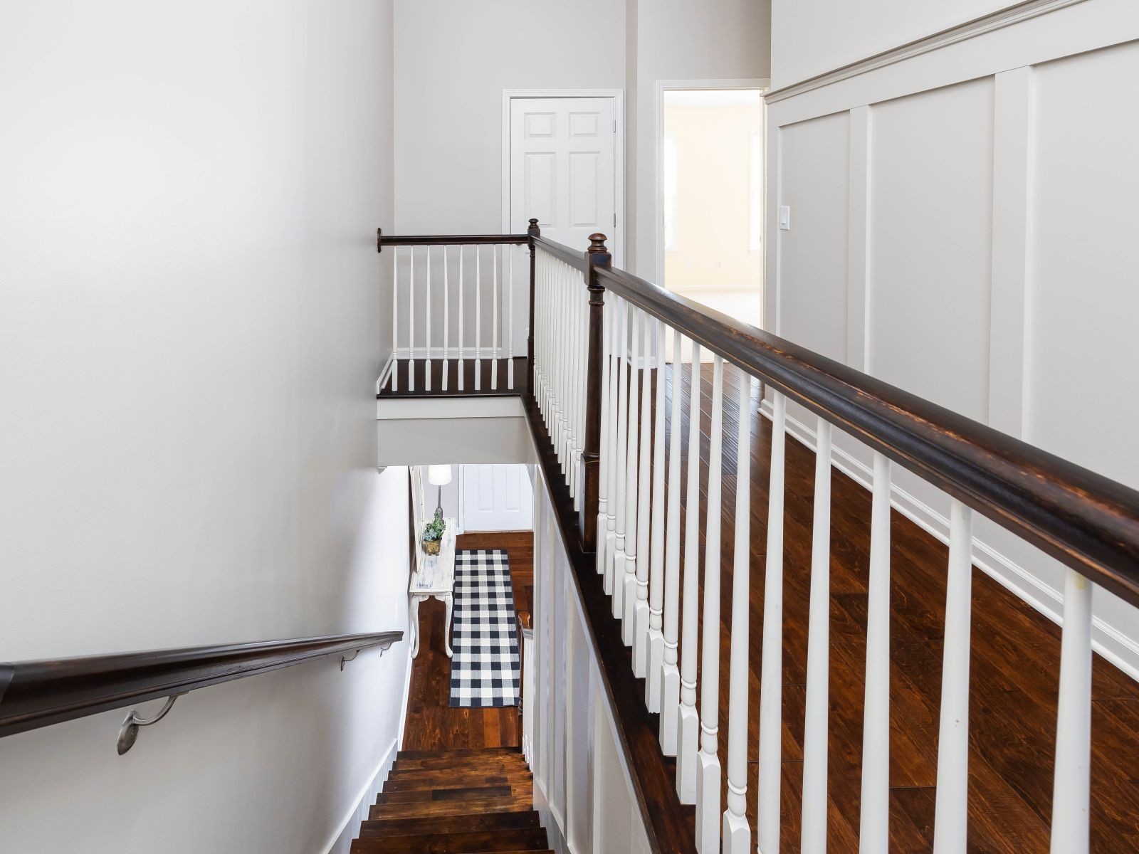 110 Pearl Street Franklin, TN 37064 - Photo 33 of 38 a view of staircase with wooden floor and white walls