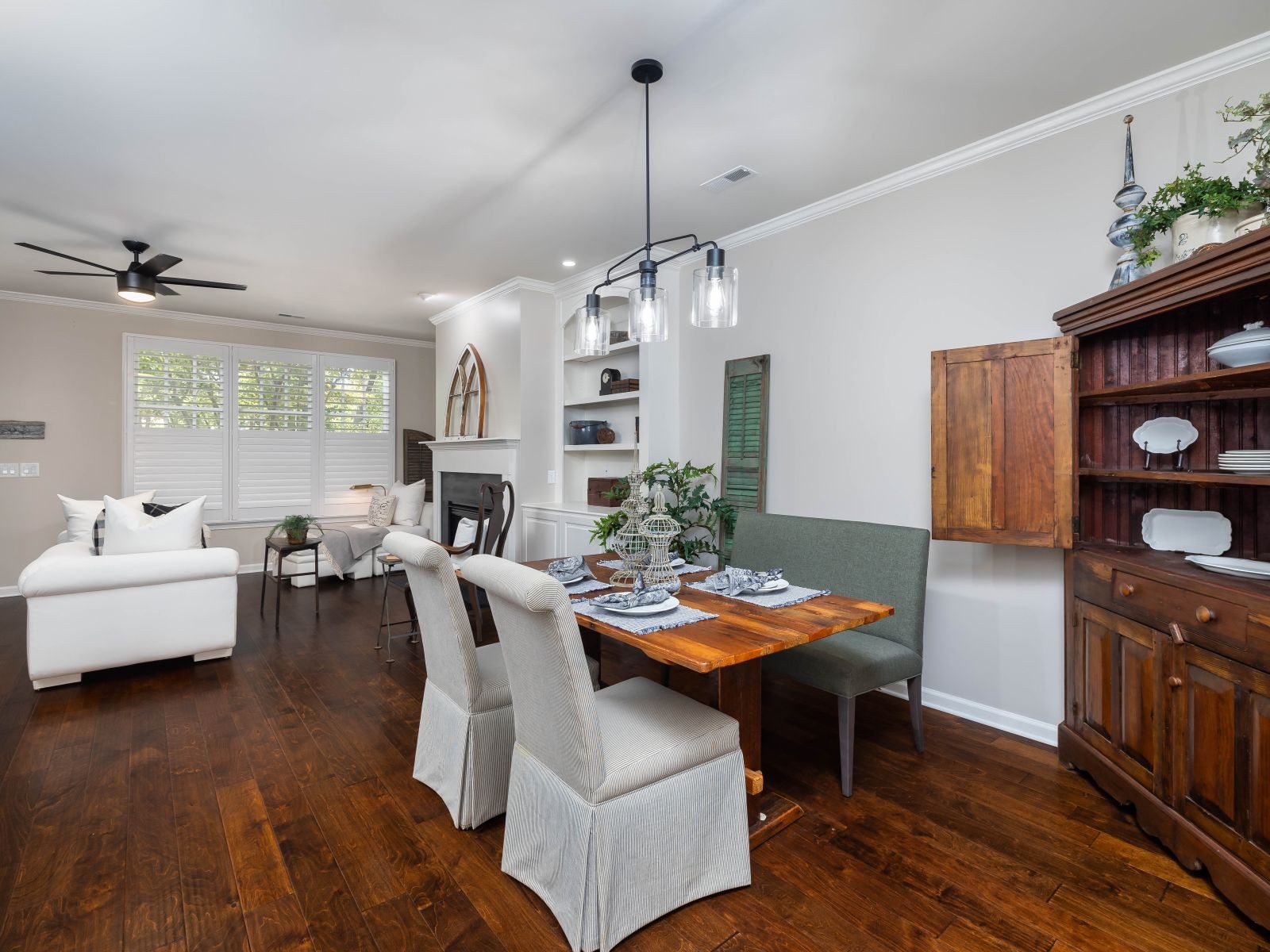 110 Pearl Street Franklin, TN 37064 - Photo 8 of 38 a dining room with furniture a chandelier and wooden floor