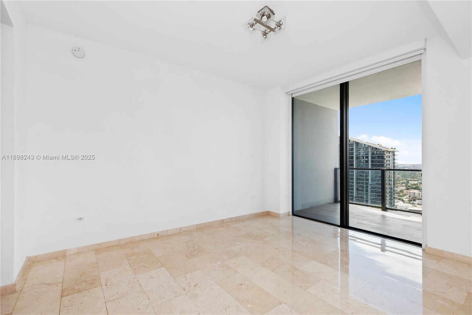 68 Southeast 6th Street, Unit 3906 Miami, FL 33131 - Photo 20 of 48 a view of an empty room