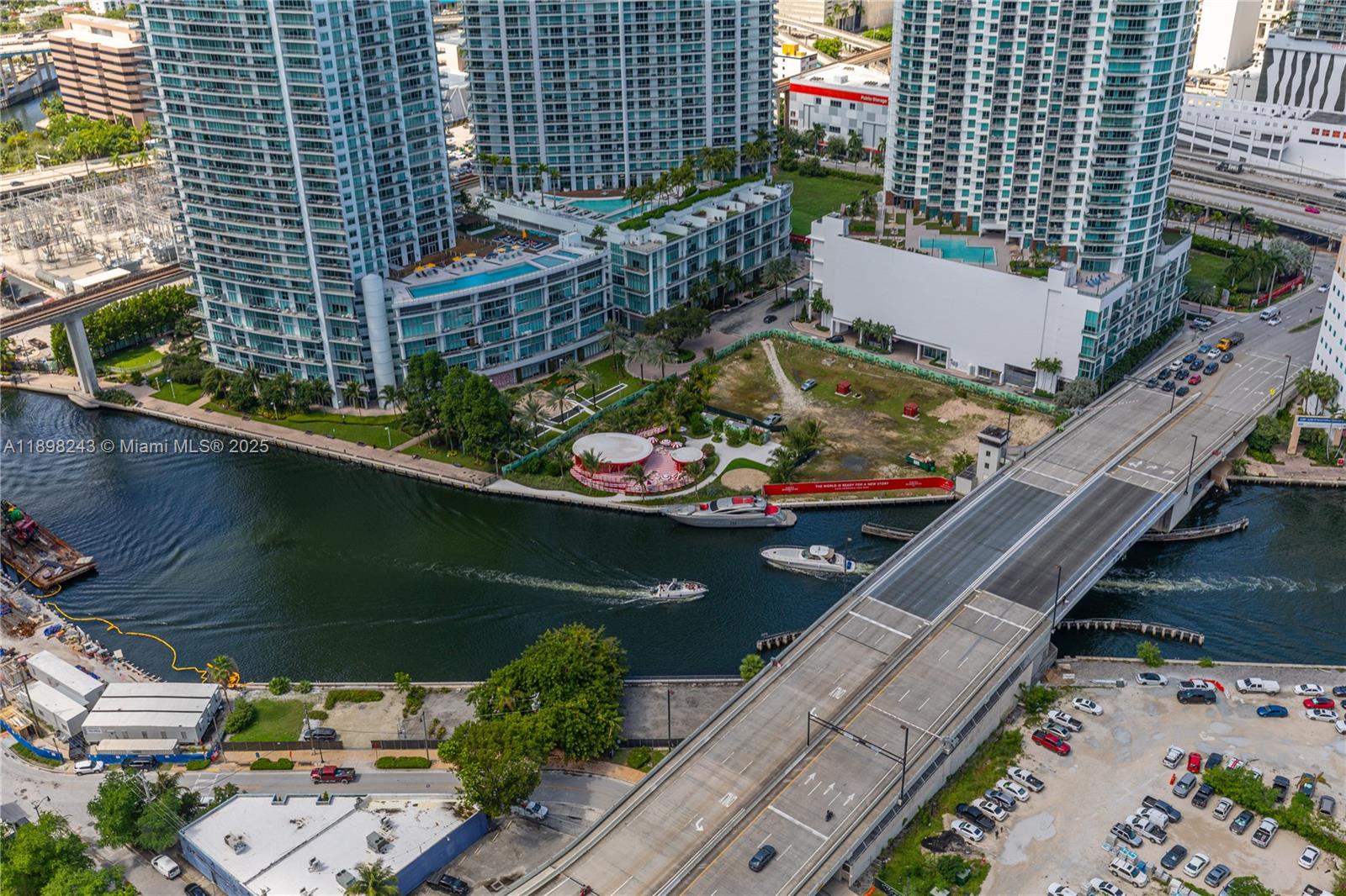 68 Southeast 6th Street, Unit 3906 Miami, FL 33131 - Photo 36 of 48 a view of swimming pool from a balcony