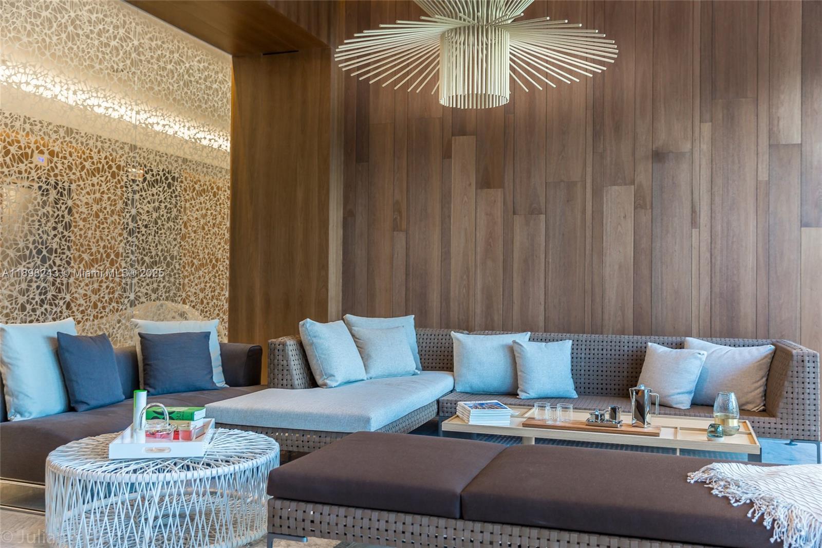 68 Southeast 6th Street, Unit 3906 Miami, FL 33131 - Photo 45 of 48 a living room with furniture and a large window