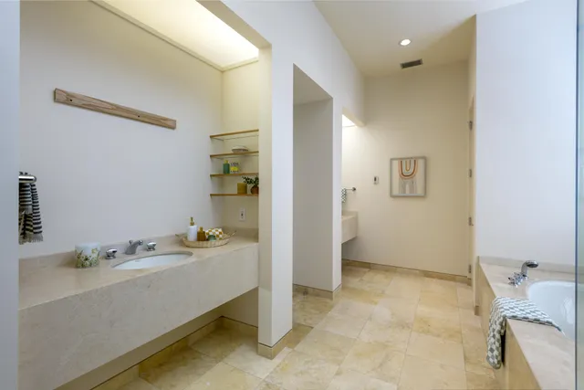a bathroom with a sink and a tub