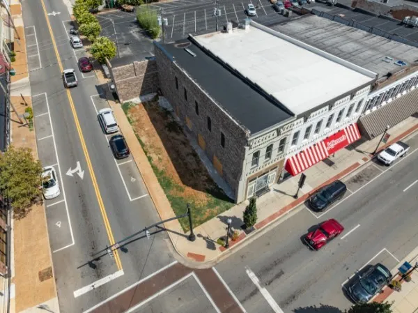 an aerial view of a building with outdoor space