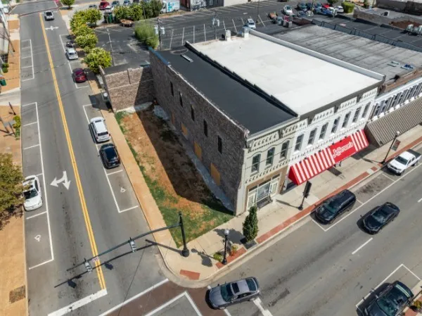 an aerial view of a city with lots of residential buildings