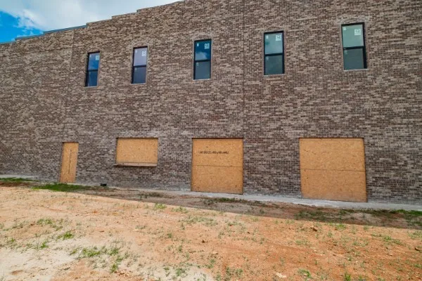 a street view with a building in the background