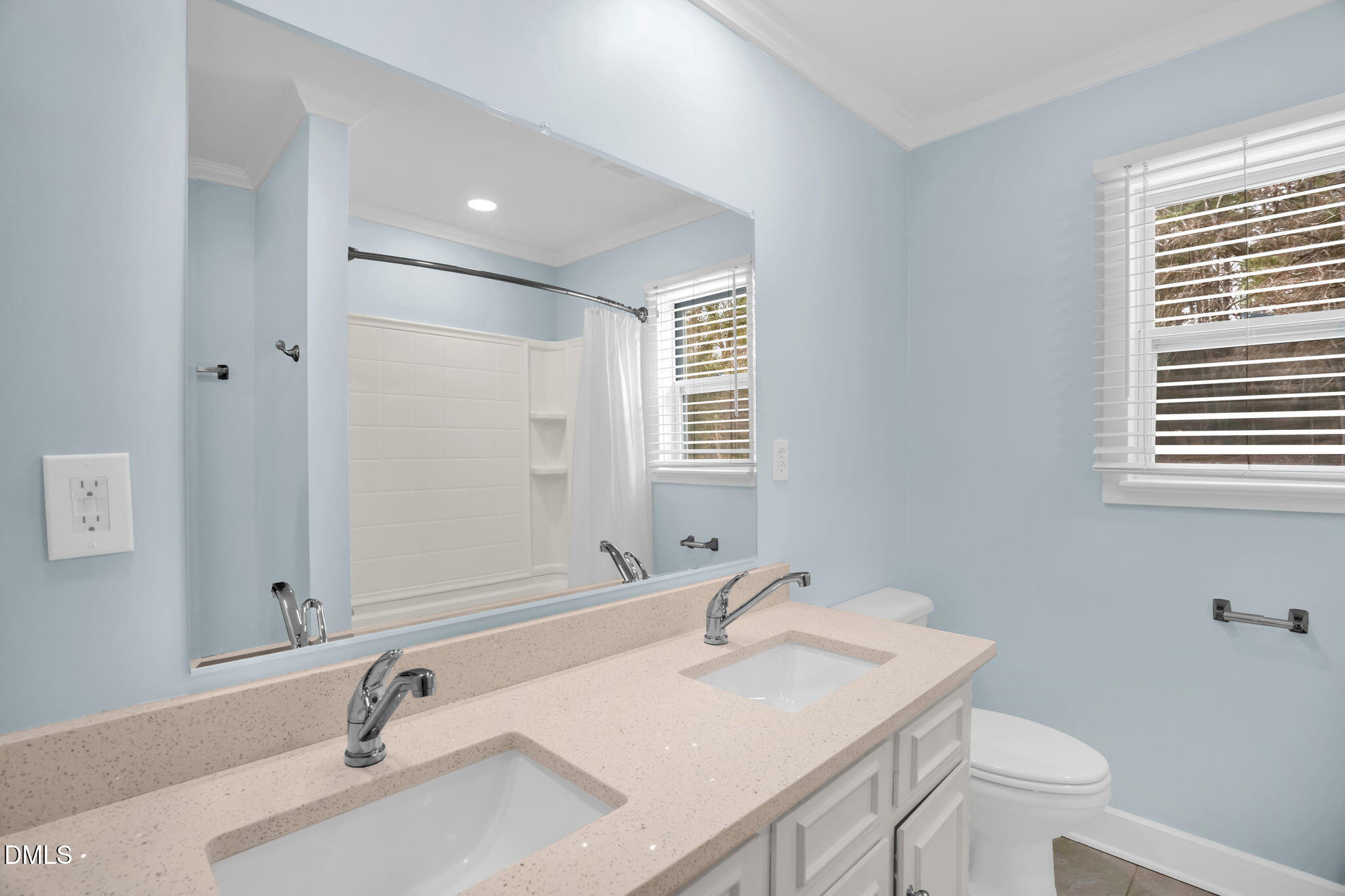 2807 Beck Road Durham, NC 27704 - Photo 10 of 35 a bathroom with a sink and a toilet
