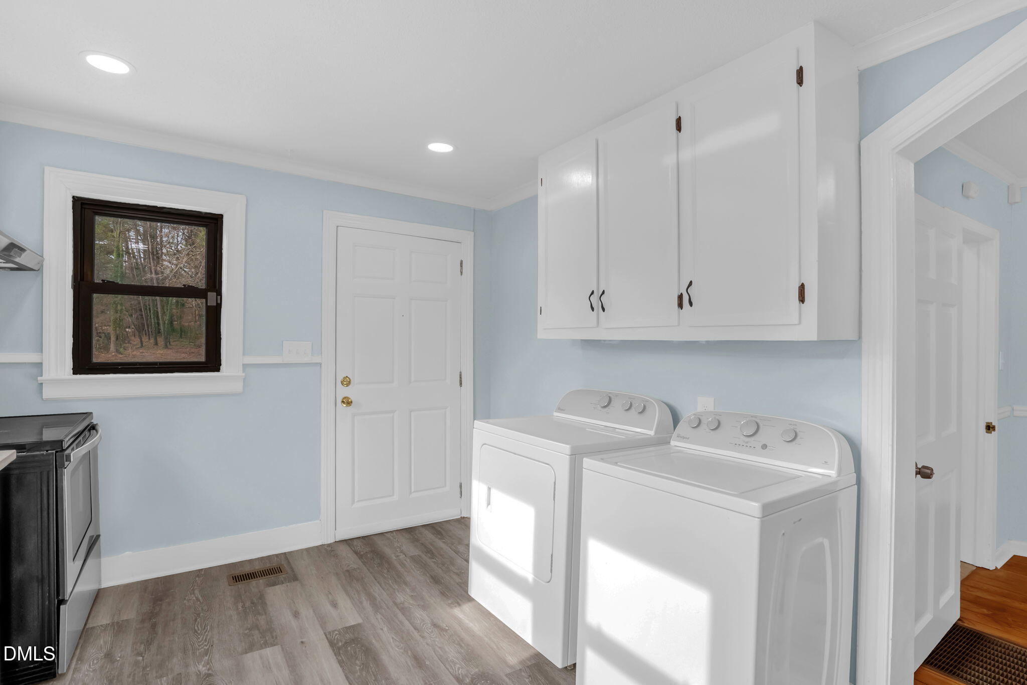 2807 Beck Road Durham, NC 27704 - Photo 16 of 35 a view of a storage & utility room with a washer dryer