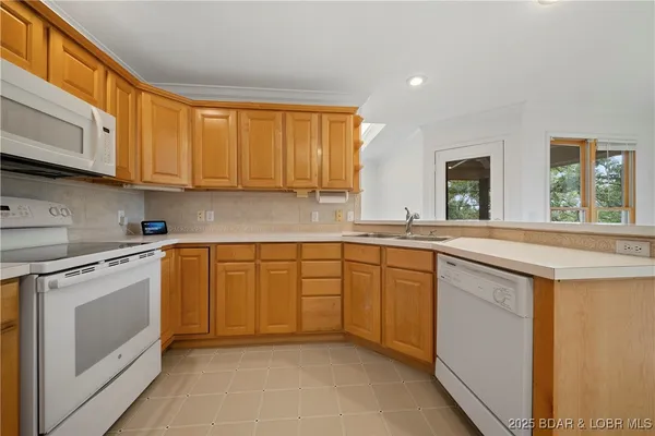 $540,000 | 1409 Robyn Court, Osage Beach, MO 65065