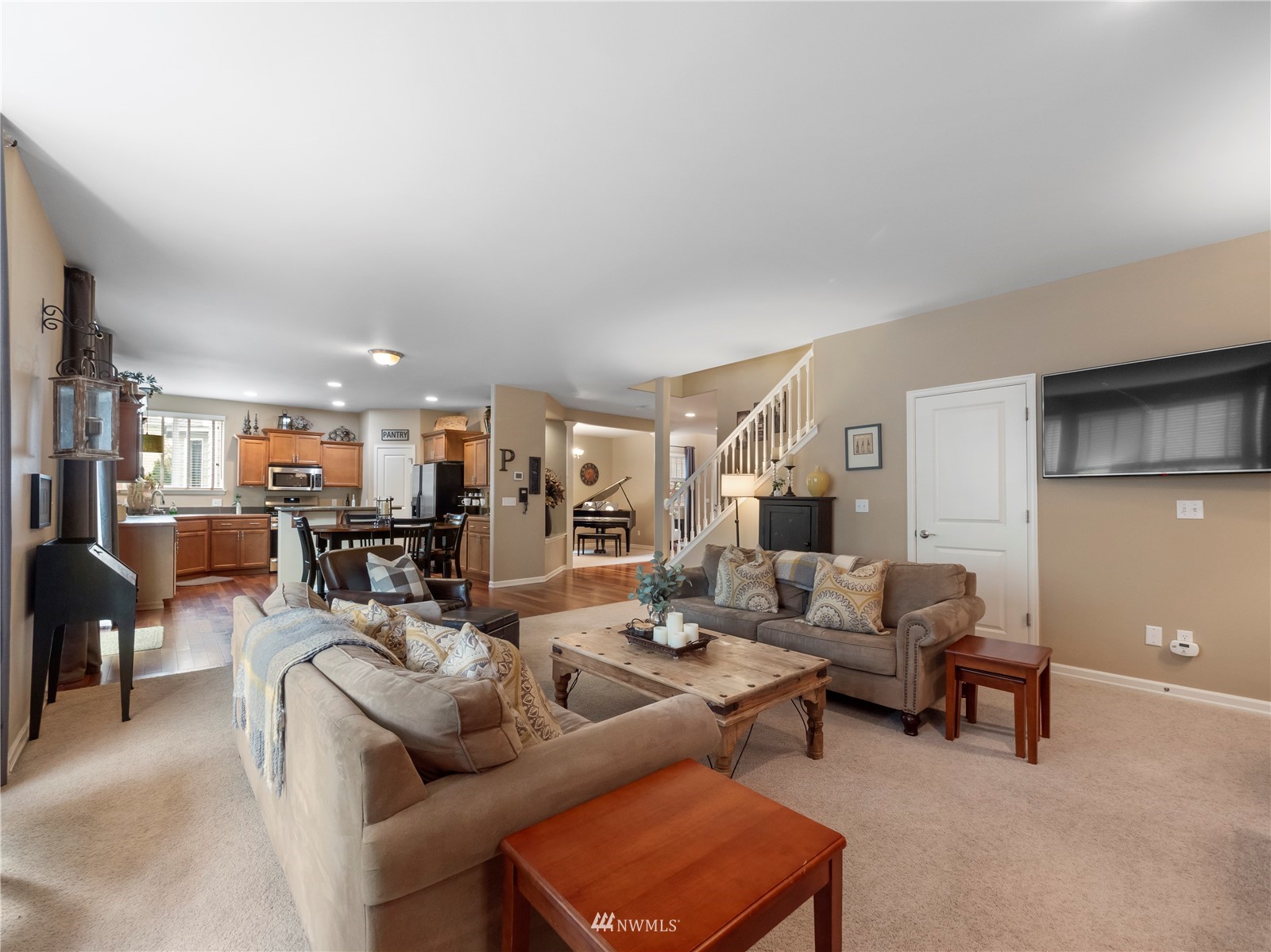 16529 37th Drive Southeast Bothell, WA 98012 - Photo 16 of 40 a living room with furniture and a large window