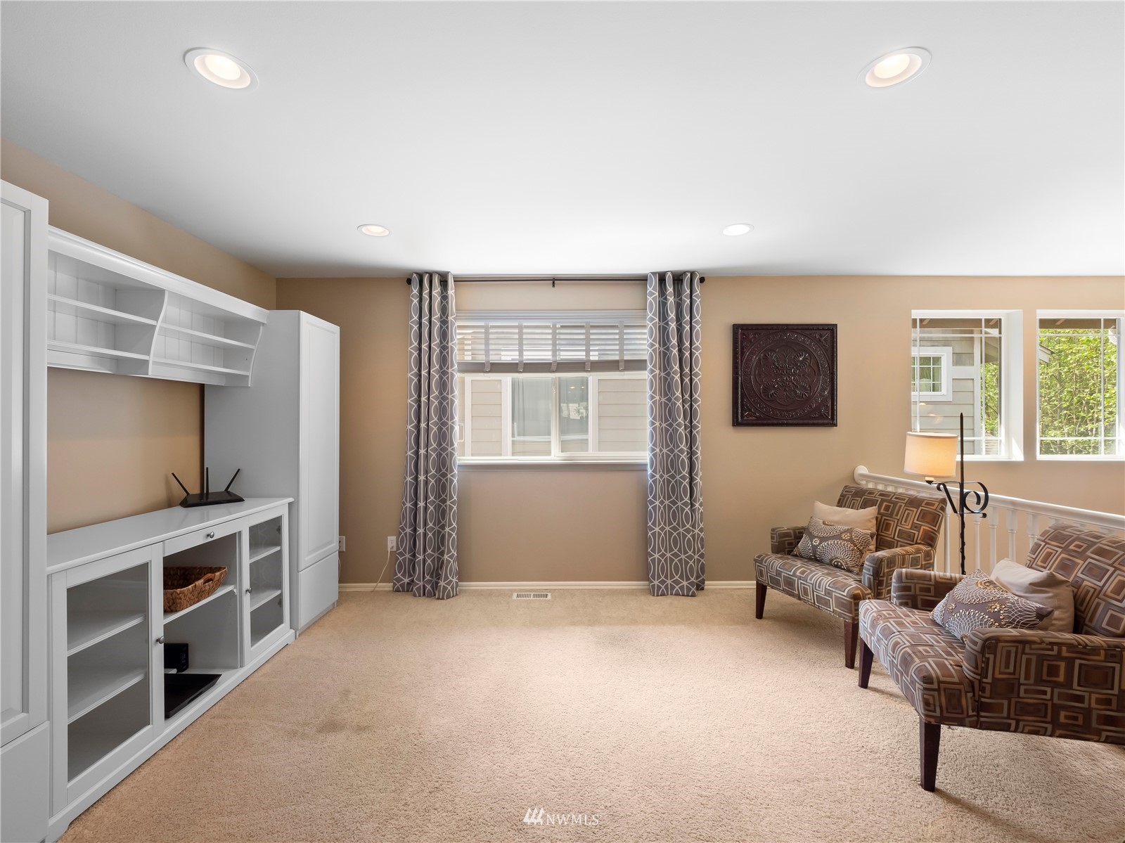 16529 37th Drive Southeast Bothell, WA 98012 - Photo 20 of 40 a living room with furniture and a flat screen tv