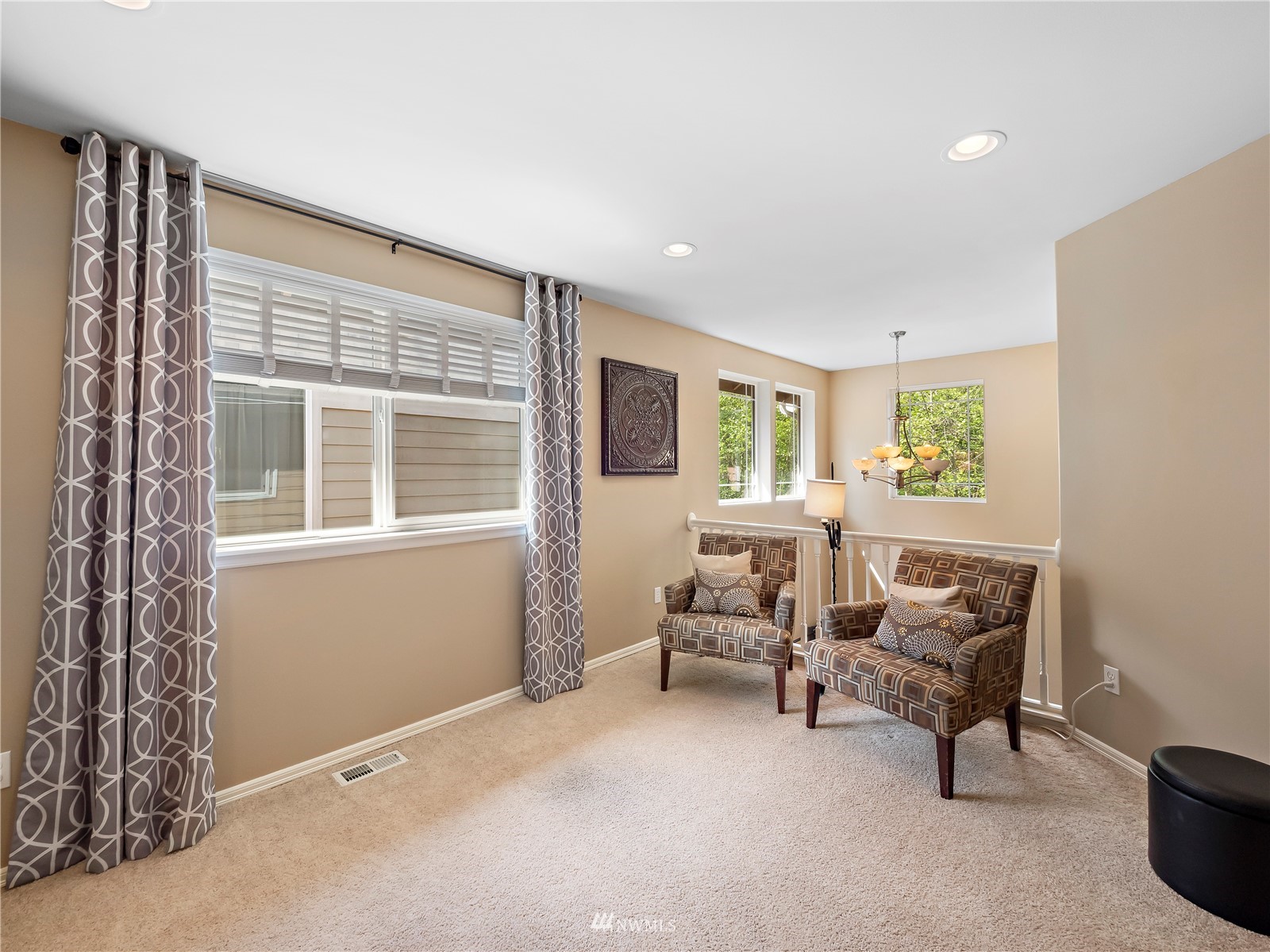 16529 37th Drive Southeast Bothell, WA 98012 - Photo 21 of 40 a living room with furniture and a window