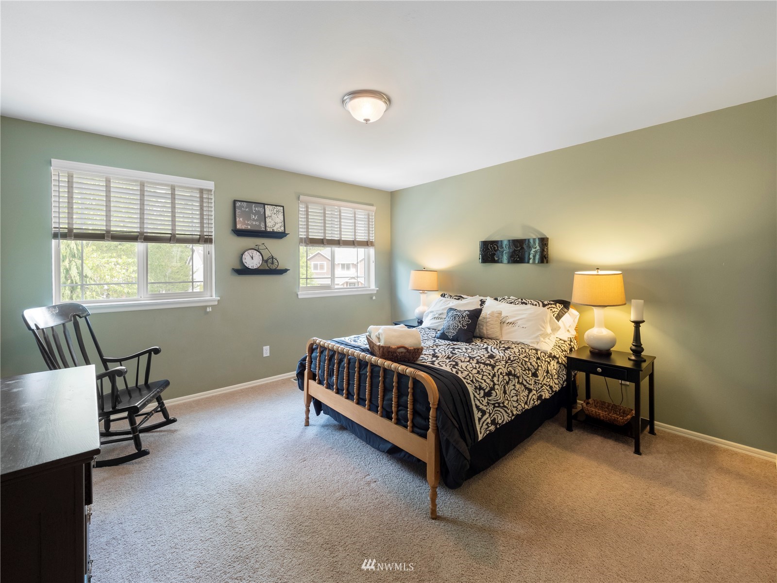 16529 37th Drive Southeast Bothell, WA 98012 - Photo 30 of 40 a bedroom with a bed chair and window