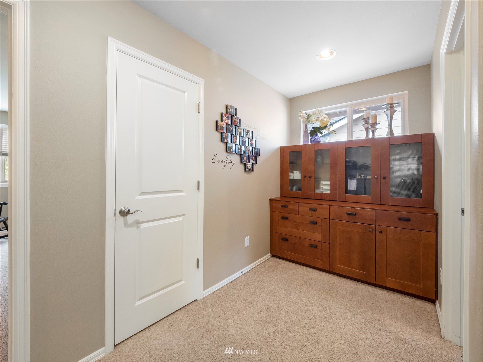 16529 37th Drive Southeast Bothell, WA 98012 - Photo 35 of 40 a room with a dresser and a mirror