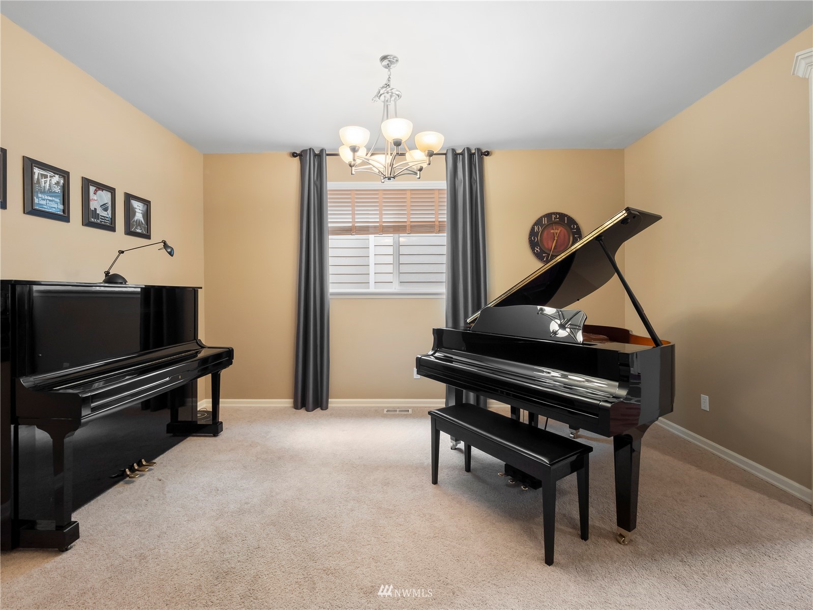16529 37th Drive Southeast Bothell, WA 98012 - Photo 9 of 40 a room with furniture piano and a window
