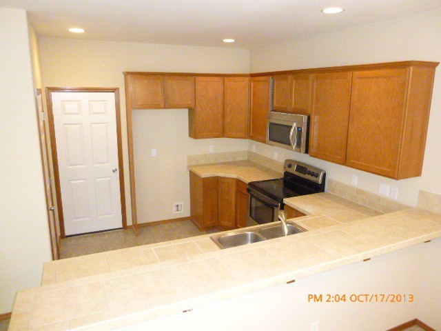 4120 150th Street Southeast Bothell, WA 98012 - Photo 5 of 16 a bed room with a bed
