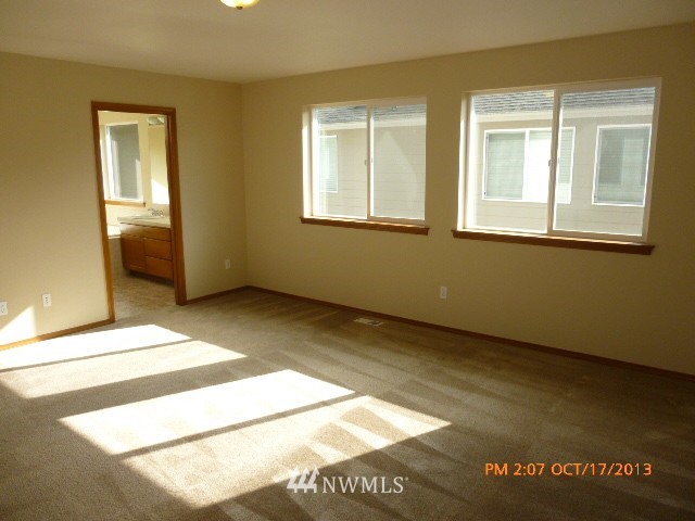4120 150th Street Southeast Bothell, WA 98012 - Photo 8 of 16 a view of an empty room and window