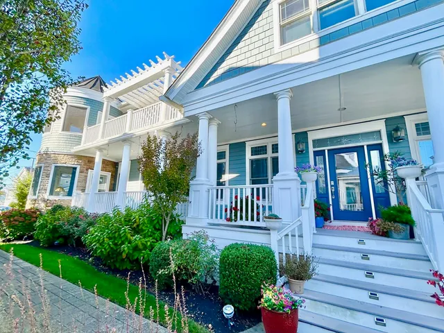 a front view of a house with a porch
